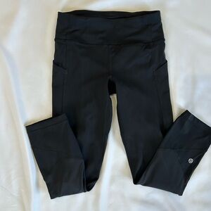 Lululemon black leggings with side pockets. Size 2